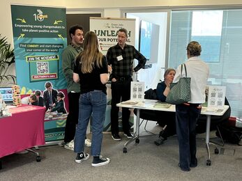 Ellen talks to two men at another stall at the BTO Youth Summit careers fair