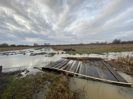 Woodwalton Fen bridge flood damaged so severely as to require large machinery to repair